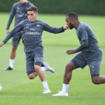 Lacazette and Torreira in training