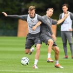 Holding and Lichtsteiner in training