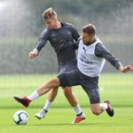 Aaron Ramsey and Rob Holding in training
