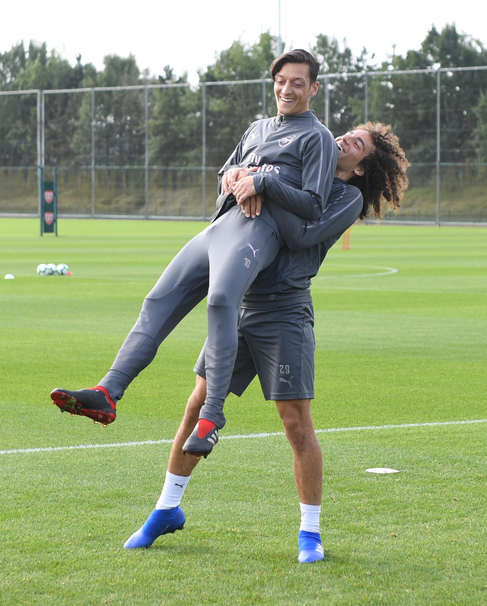 Guendouzi and Mesut Ozil in training